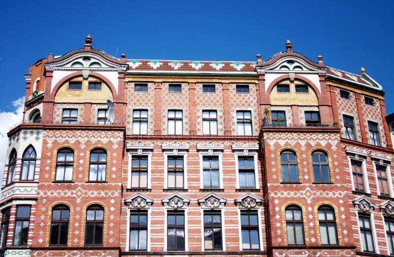 Architecture, the old brick house under blue sky stock photos