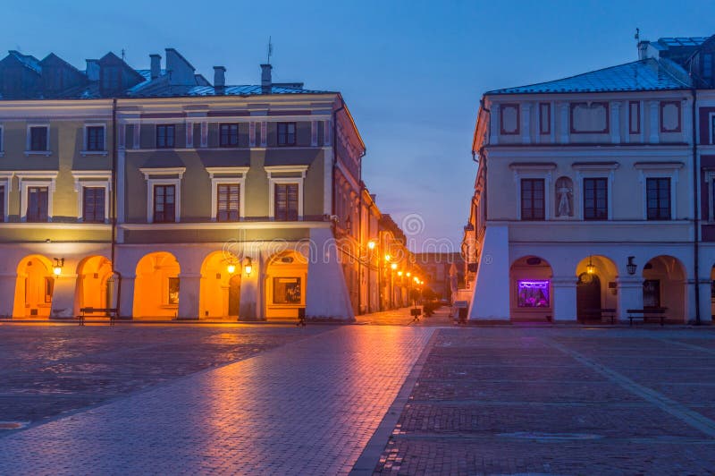 Architecture of old town of Zamosc at night. Historical city in southeastern Poland and a UNESCO World Heritage Site