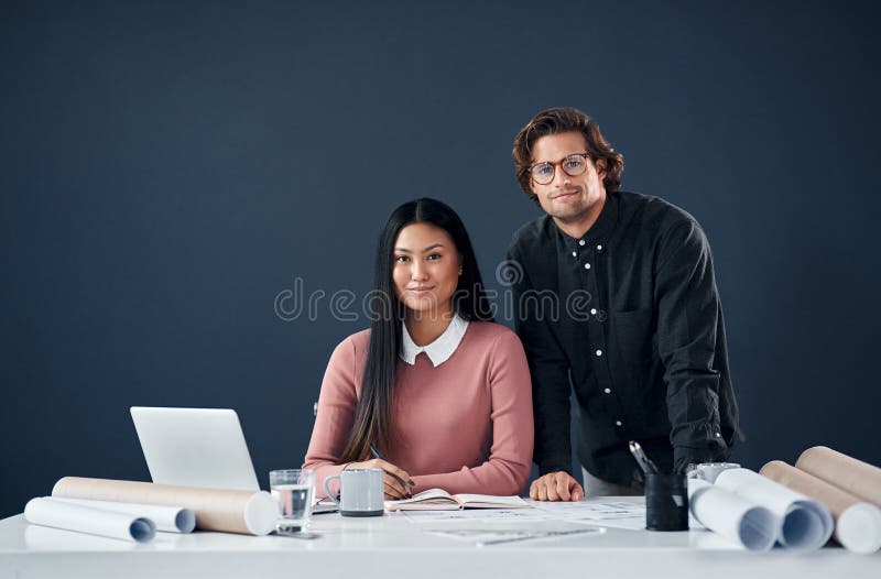 Architecture, portrait and team with confidence, laptop and blueprint for creative ideas in building development royalty free stock photos
