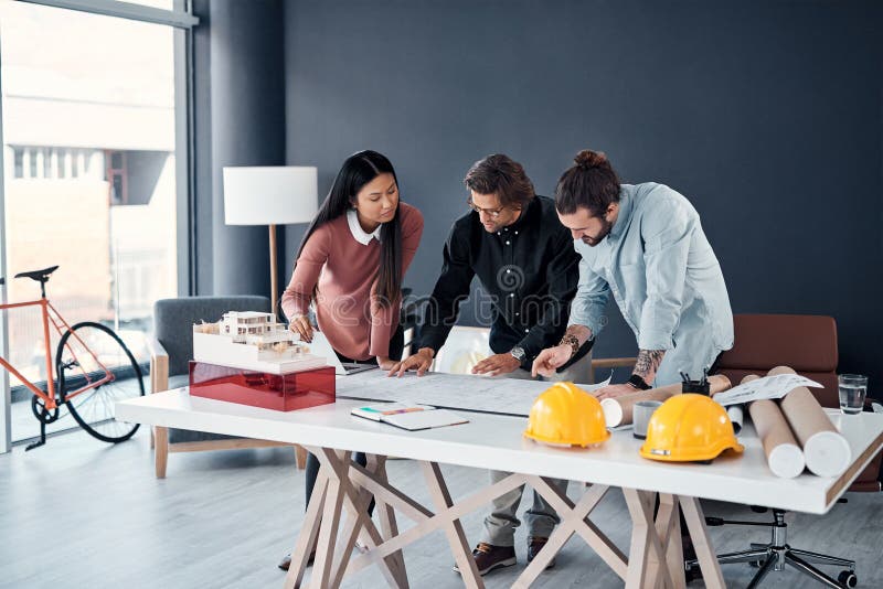 Architecture, teamwork and blueprint with planning in office for design layout, floor plan or remodeling project stock photos