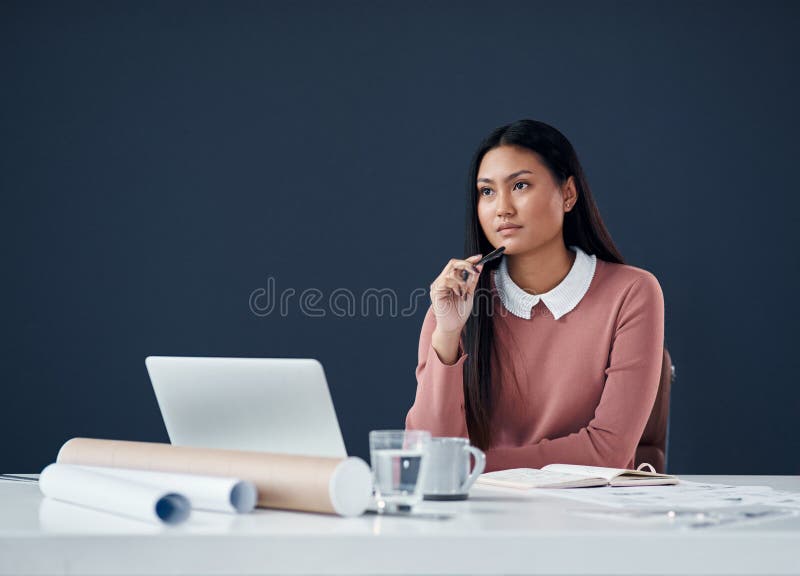 Architecture, thinking and Asian woman with laptop, ideas and insight for creative planning in office. Research royalty free stock photography