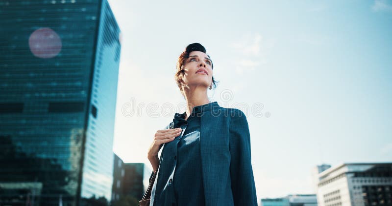 Architecture, thinking and business woman in city with idea, brainstorming and planning for career. Professional royalty free stock images