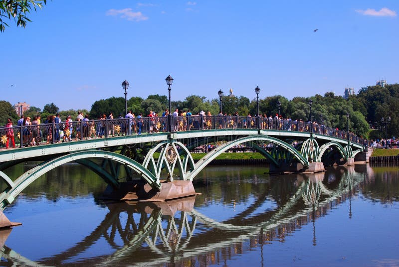 MOSCOW - JULY 26, 2015: Architecture of Tsaritsyno park in Moscow. Popular touristic landmark. A bridge over the pond. MOSCOW - JULY 26, 2015: Architecture of Tsaritsyno park in Moscow. Popular touristic landmark. A bridge over the pond.