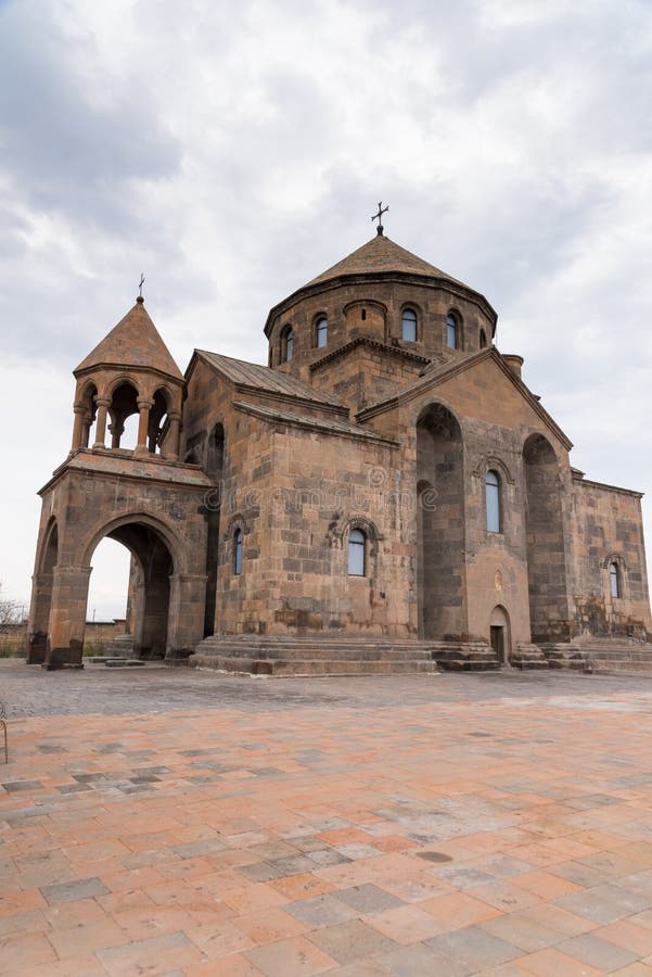 St. Hripsime Church is a domed tetraconch enclosed in a rectangle, with two angular niches on the northern and southern side. St. Hripsime Church is a domed tetraconch enclosed in a rectangle, with two angular niches on the northern and southern side.