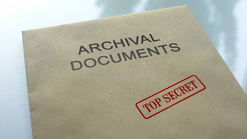 Archival documents top secret, seal stamped on folder with documents, close up, stock photo. Archival documents top secret, seal stamped on folder with documents, close up, stock photo