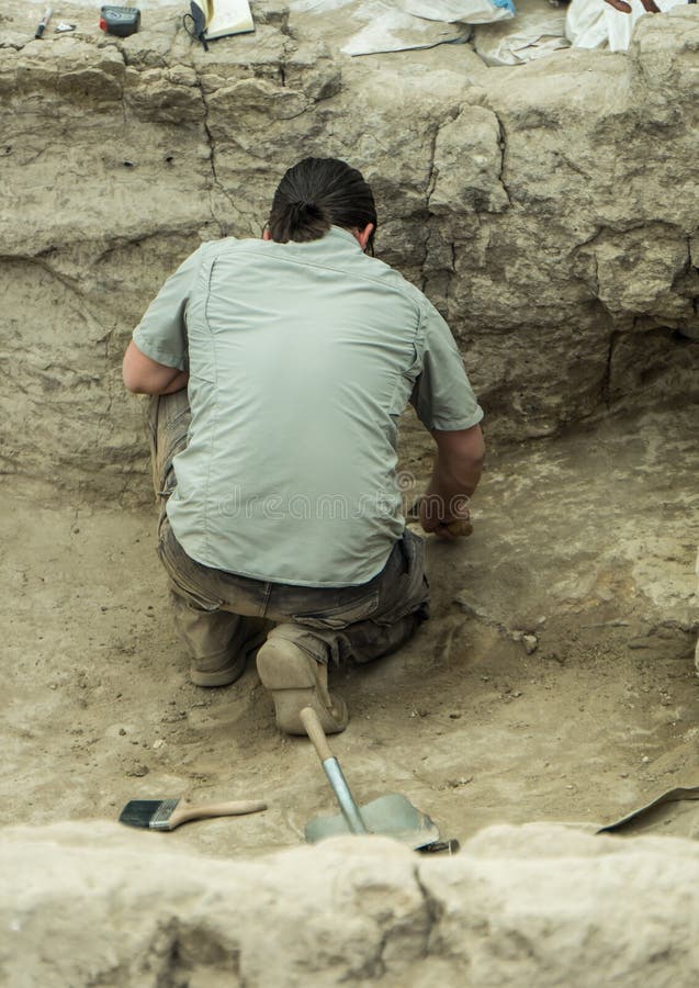 Cumra, Konya/Turkey June 1 2016: Archaeologist work in Catalhoyuk. Built in 7500 B.C. Catalhoyuk is the oldest settlement in the world. Neolithic and Chalcolithic period Historic and Archaeological area. Cumra, Konya/Turkey June 1 2016: Archaeologist work in Catalhoyuk. Built in 7500 B.C. Catalhoyuk is the oldest settlement in the world. Neolithic and Chalcolithic period Historic and Archaeological area.