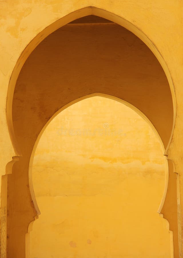 An Islamic style arch decorating a building in Meknes, Morocco. An Islamic style arch decorating a building in Meknes, Morocco.