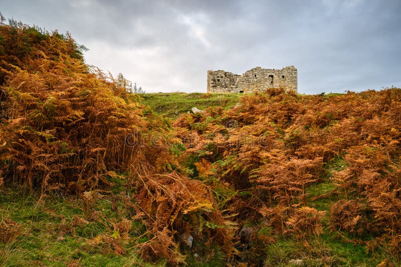 The ruins of an early 17th century bastle or defensible farmhouse in the Anglo-Scottish Borders as protection against Border Reivers. The ruins of an early 17th century bastle or defensible farmhouse in the Anglo-Scottish Borders as protection against Border Reivers