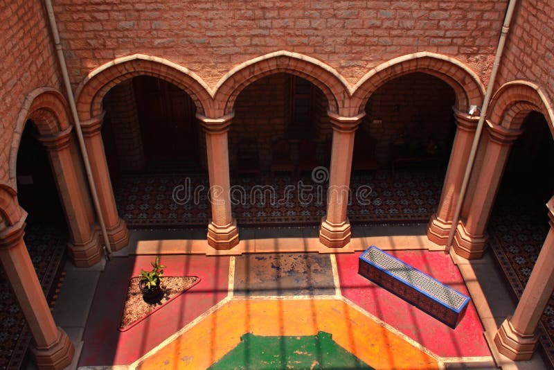 An areal view of ornamental courtyard with sunlight in the palace of bangalore.