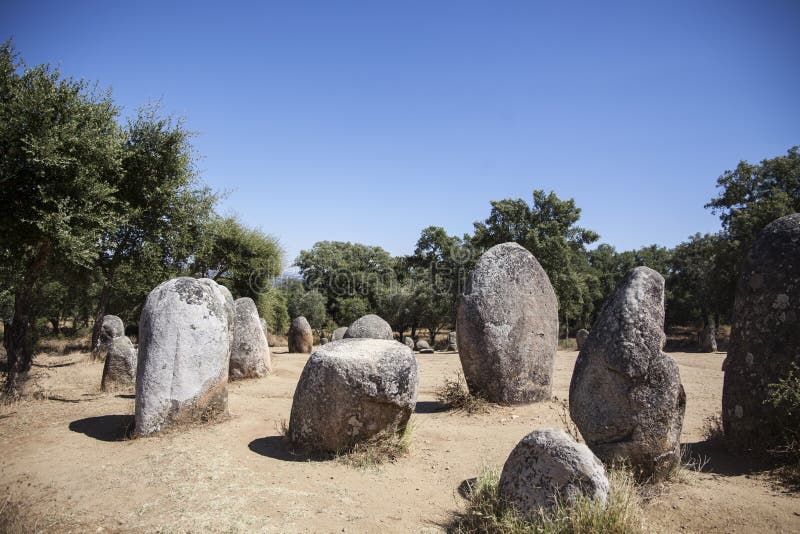 Cromlech de almendres view of the circle of stones. The areas of Extremadura Spain and Alentejo Portugal bring together a huge amount of megalithic stock photo Cromlech de almendres view of the circle of stones. The areas of Extremadura Spain and Alentejo Portugal bring together a huge amount of megalithic stock photo