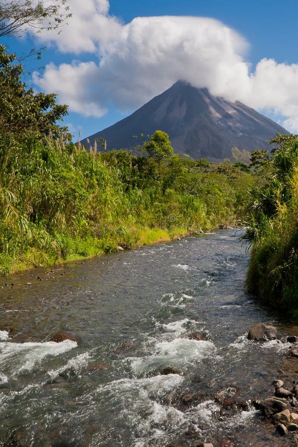 Landscape in Arenal National Park, Costa Rica, with river and volcano. Landscape in Arenal National Park, Costa Rica, with river and volcano