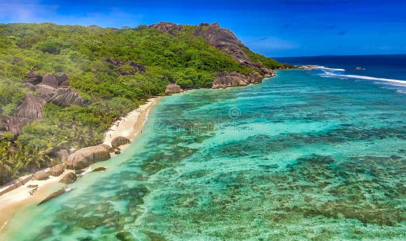 Anse Source Argent, La Digue. Amazing aerial view from drone on a beautiful sunny day - Seychelles Islands. Anse Source Argent, La Digue. Amazing aerial view from drone on a beautiful sunny day - Seychelles Islands