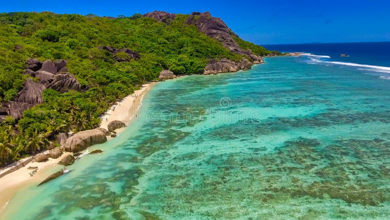 Anse Source Argent, La Digue. Amazing aerial view from drone on a beautiful sunny day - Seychelles Islands. Anse Source Argent, La Digue. Amazing aerial view from drone on a beautiful sunny day - Seychelles Islands