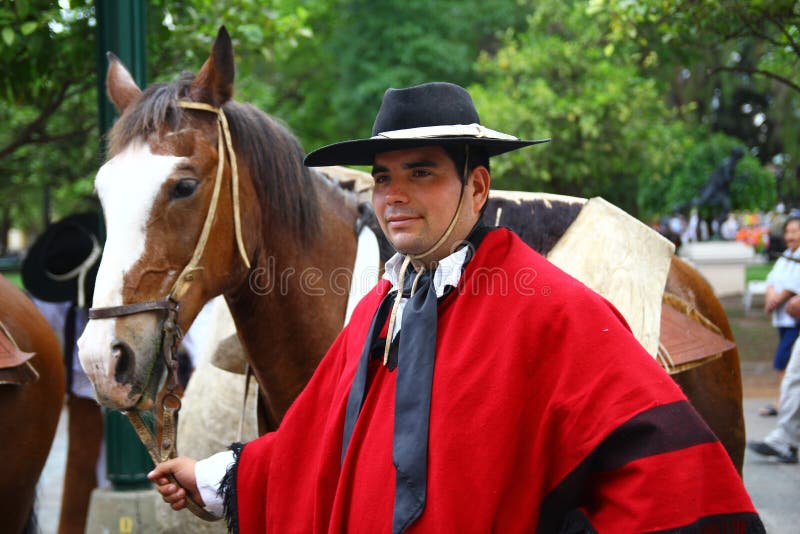 Argentina rider in red cape