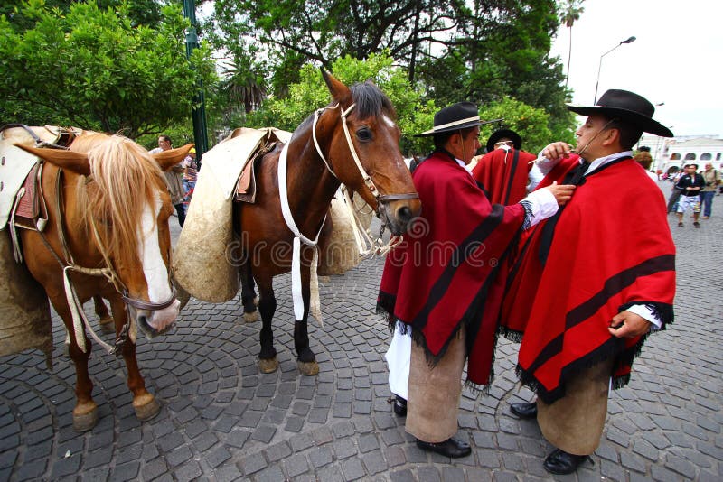 Argentina riders in red cape