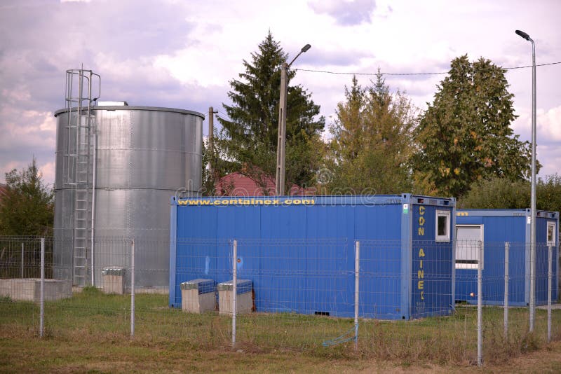 Arges Romania - 09 26 2020: drinking water tank to supply houses financed from European funds. barometric pressure watch