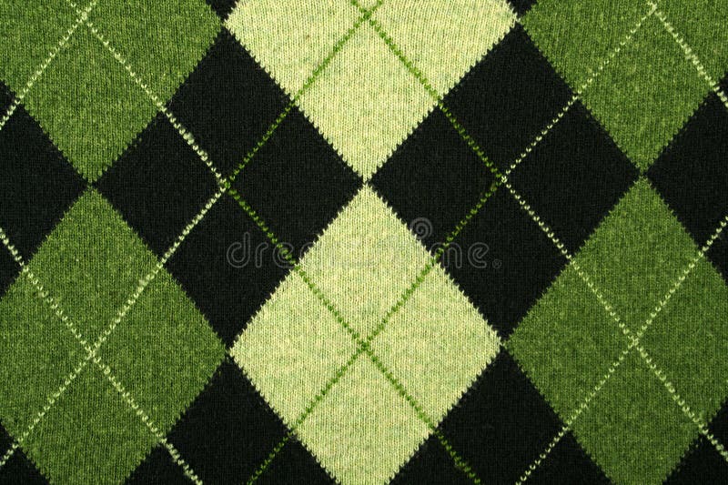 Argyle pattern in green color tones on a sweater. Argyle pattern in green color tones on a sweater