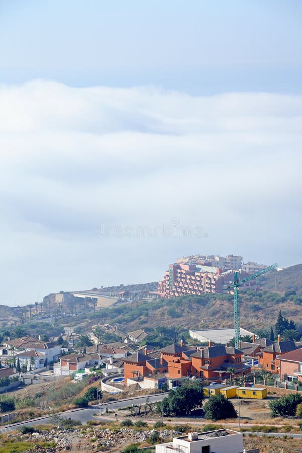 Arial view of construction site, villas and cranes
