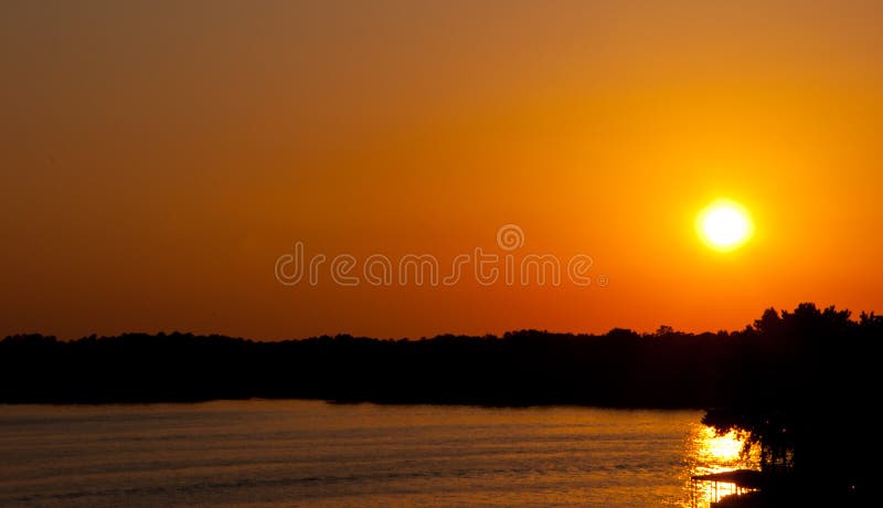 Arkansas Ozark Mountain Sunset hits the horizon Rainforest