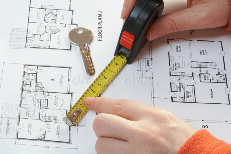 House key, measure over architectural plan. House key, measure over architectural plan