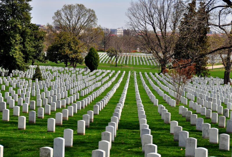 Arlington, Virginia: Row upon row of military gravesites on a hilly slope at Arlington National Cemetery. *. Arlington, Virginia: Row upon row of military gravesites on a hilly slope at Arlington National Cemetery. *