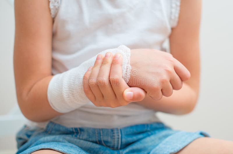 Arm with gauze bandage. stock photo