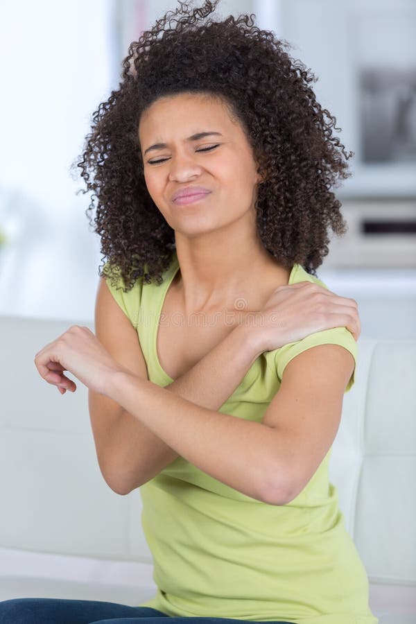 Arm pain old women stock image. Image of adult, interior 103625277