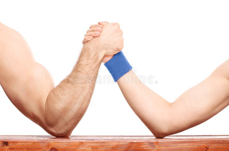 Arm wrestling between a muscular arm and skinny one