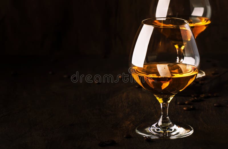 Armagnac, French grape brandy, strong alcoholic drink. Still life in vintage style, selective focus