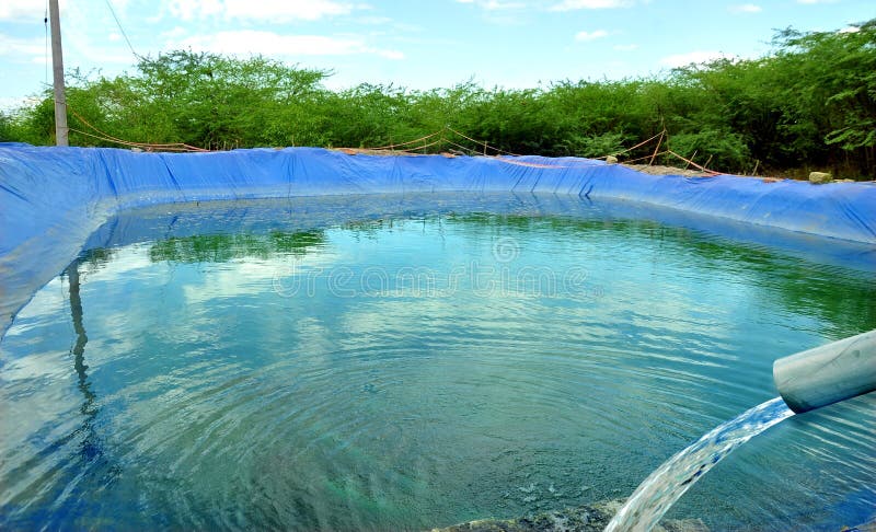 Camera shot on agriculture water storage with plastic waterproof tarpaulin. Camera shot on agriculture water storage with plastic waterproof tarpaulin