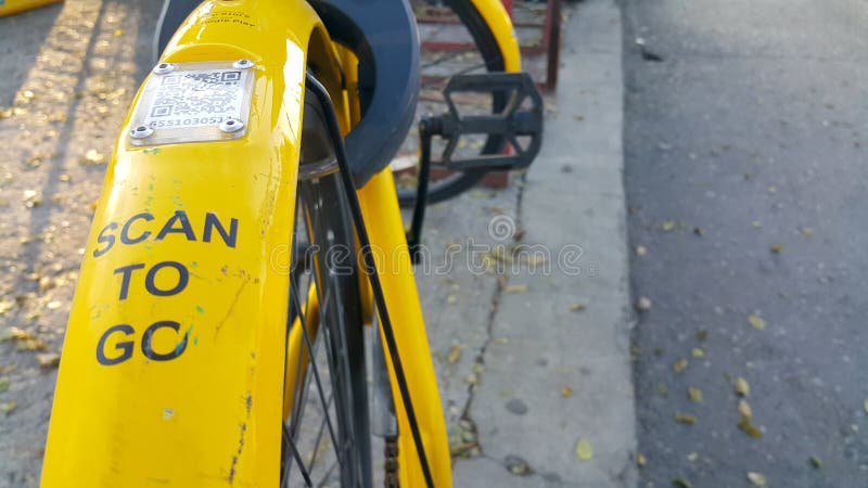 ARMENIA, YEREVAN-OCTOBER 15, 2020. A city Bicycle wheel with an inscription on it, a transition scan, and a QR code icon. The royalty free stock photography