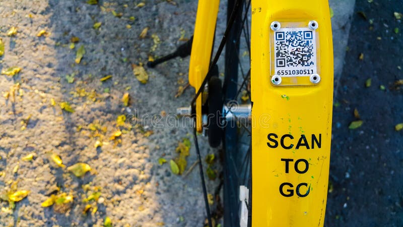 ARMENIA, YEREVAN-OCTOBER 15, 2020. A city Bicycle wheel with an inscription on it, a transition scan, and a QR code icon. The stock image