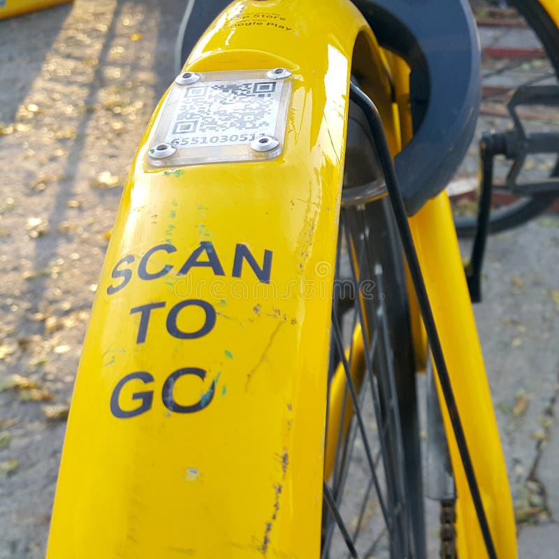 ARMENIA, YEREVAN-OCTOBER 15, 2020. A city Bicycle wheel with an inscription on it, a transition scan, and a QR code icon. The stock photos