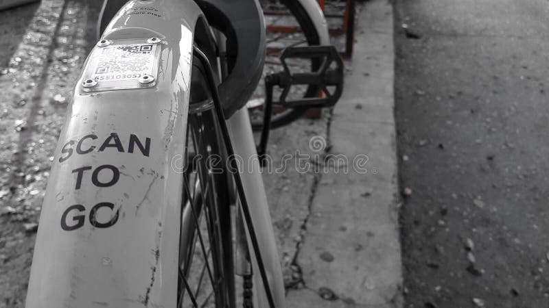 ARMENIA, YEREVAN-OCTOBER 15, 2020. A city Bicycle wheel with an inscription on it, a transition scan, and a QR code icon. The stock image