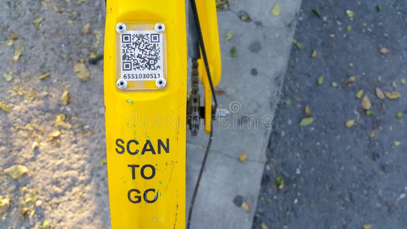 ARMENIA, YEREVAN-OCTOBER 15, 2020. A city Bicycle wheel with an inscription on it, a transition scan, and a QR code icon. The stock image