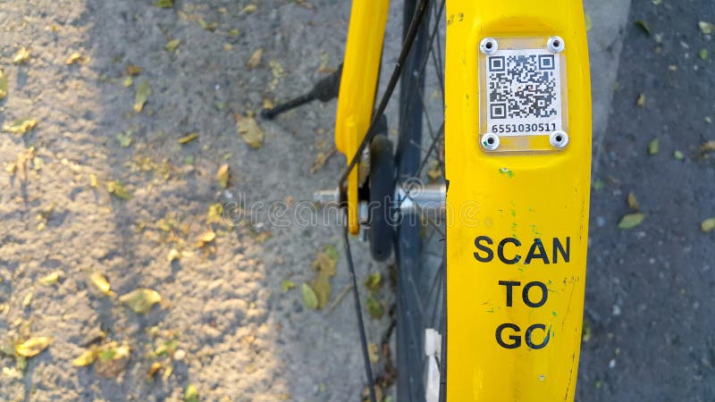 ARMENIA, YEREVAN-OCTOBER 15, 2020. A city Bicycle wheel with an inscription on it, a transition scan, and a QR code icon. The stock photo