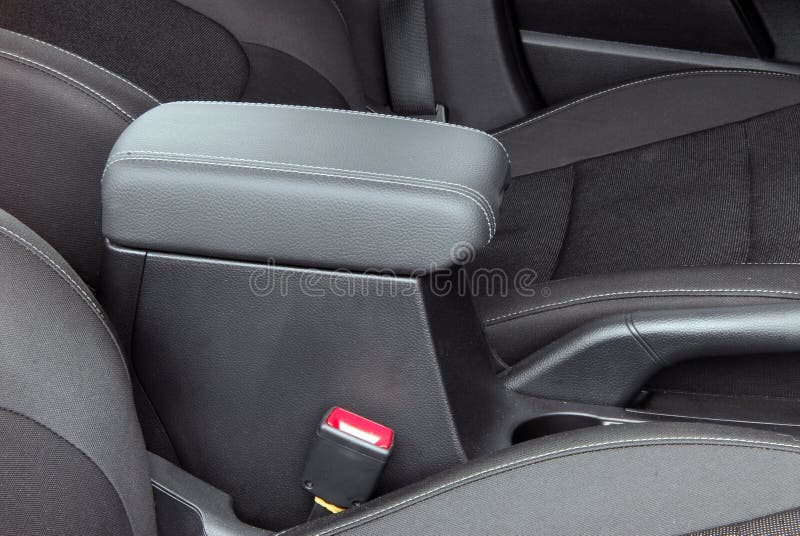 Armrest in the Luxury Passenger Car between the Front Seats Stock Photo