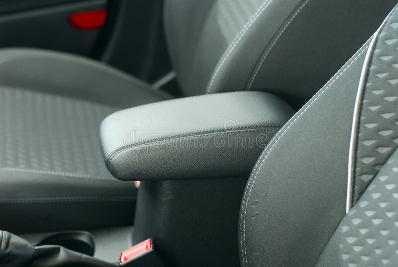 Armrest In The Luxury Passenger Car Between The Front Seats Stock Photo