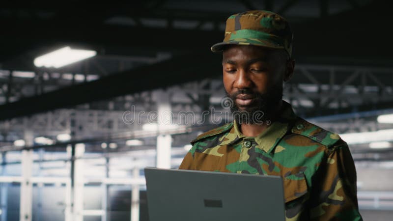 Army information technology specialist in data center troubleshooting systems stock footage