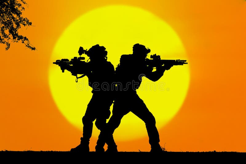 Army soldier with rifle orange sunset silhouette