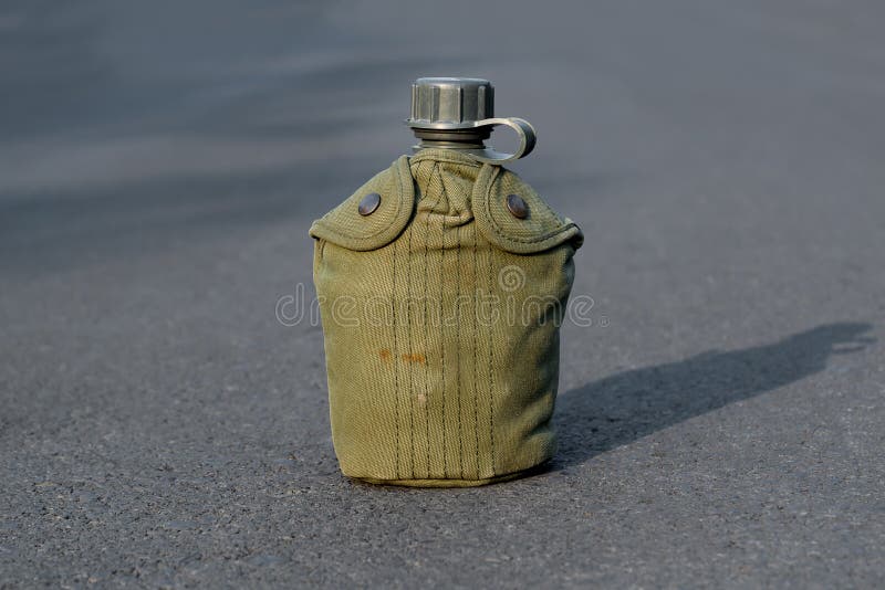 Army Water Canteen with Desert Cover Stock Photo Image of