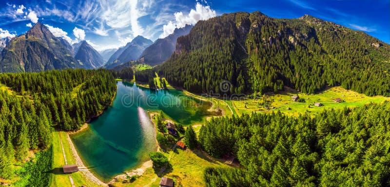 Areal view of Arnisee with Swiss Alps. Arnisee is a reservoir in the Canton of Uri, Switzerland, Europe