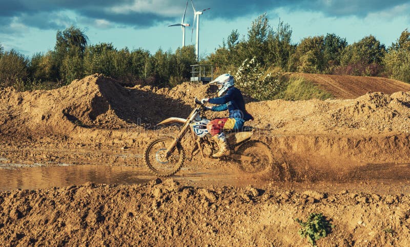 Motocross MX Rider riding on dirt track stock photography Motocross MX Rider riding on dirt track stock photography