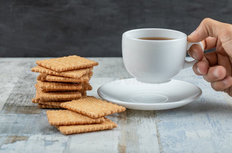 Happening sample Supply Aroma Cup of Tea with Tasty Crackers on a Wooden Table Stock Image - Image  of eating, crackers: 211400421