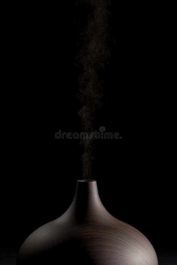 Aromatherapy diffuser. Modern electric essential oil atomizer in