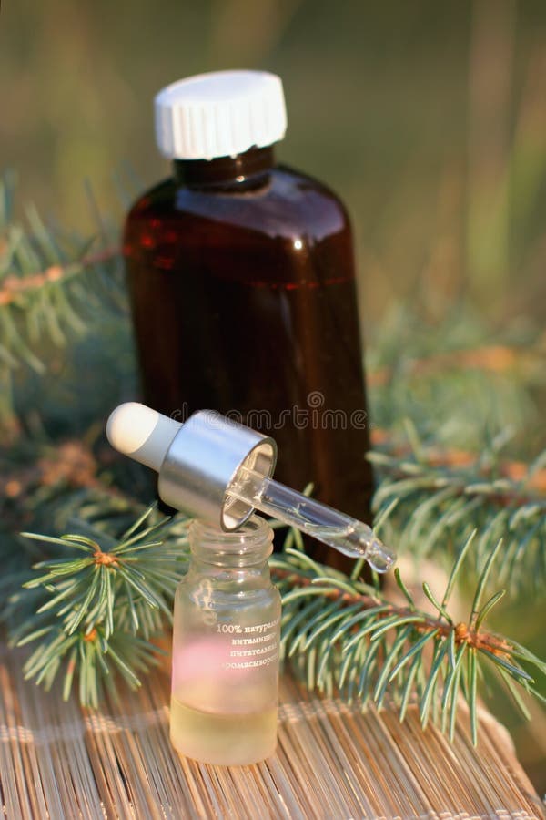 Aromatic oil extract from fir stock image Aromatic oil extract from fir stock image