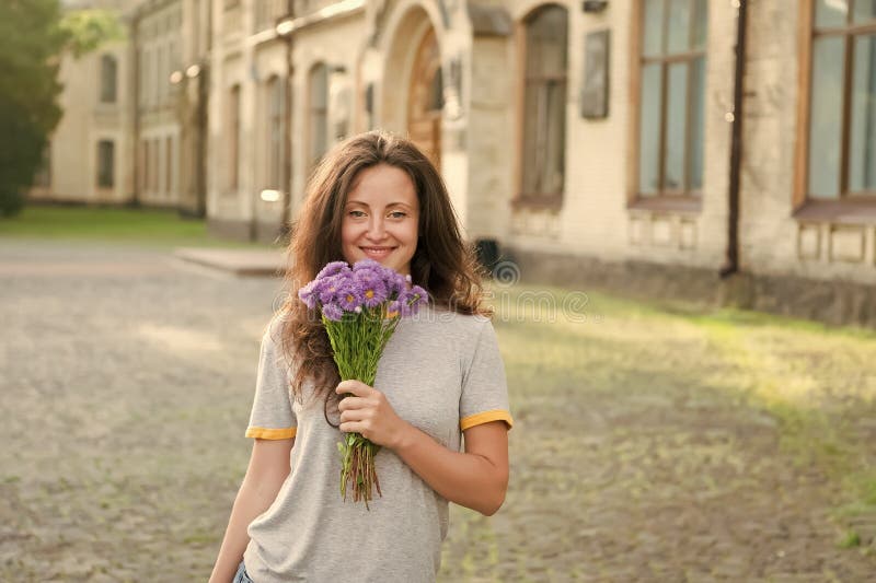 Aromatic surprise. Flowers delivery service. Adore fresh flowers. Floral shop. Springtime bloom. Natural beauty concept. Gentle flower for delicate woman. Pure royalty free stock image Aromatic surprise. Flowers delivery service. Adore fresh flowers. Floral shop. Springtime bloom. Natural beauty concept. Gentle flower for delicate woman. Pure royalty free stock image