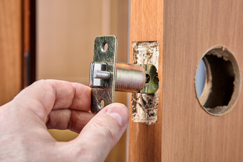 Arpenter Pushes Latch Plate Assembly into End Hole when Installing