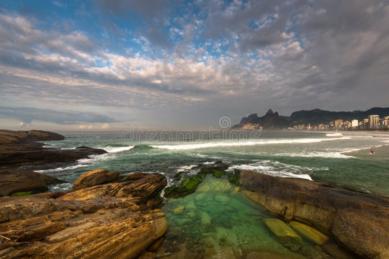 Arpoador Beach Rocks and Dramatic Sky Above Rio de Janeiro