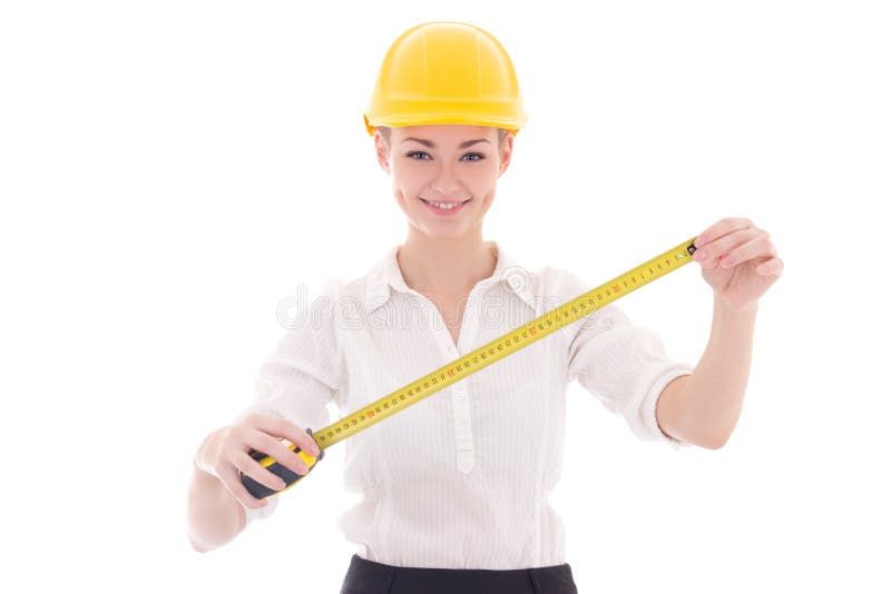 Arquitecto feliz de la mujer de negocios en measurin amarillo del casco del constructor fotografía de archivo libre de regalías Arquitecto feliz de la mujer de negocios en measurin amarillo del casco del constructor fotografía de archivo libre de regalías